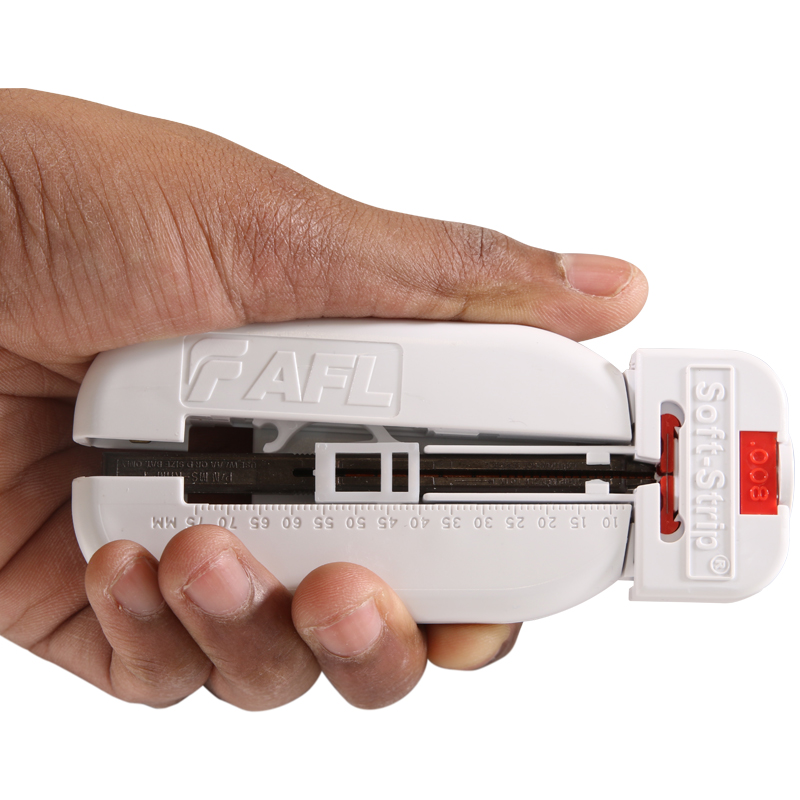 Precision Strip Tool in hand